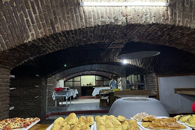 A Gastronomic Private Guided Journey Through Tbilisi - Kote Apkhazi Street wine shop: chacha in the middle of sightseeing