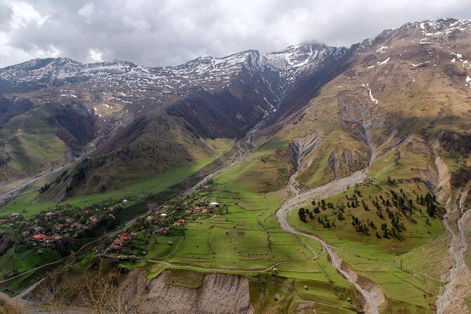 Adventure in Caucasus – Private Tour to Jinvali, Ananuri, Gudauri, Kazbegi - Gergeti Trinity Church at 2,200 meters: the photo is real