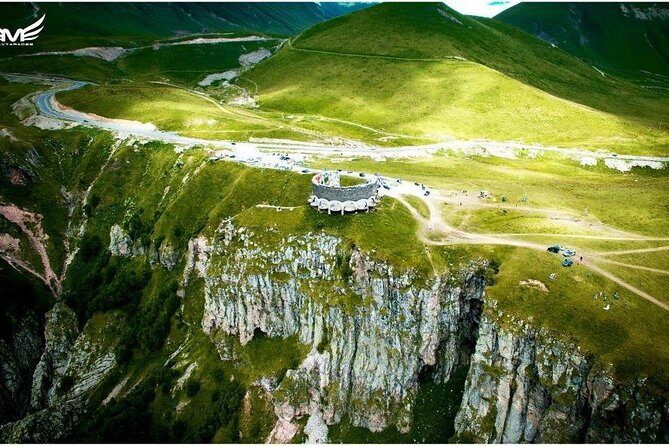 Ananuri, Gudauri, Kazbegi. Military Road of Georgia. Private tour. - Gergeti Trinity Church: the Stepantsminda jeep ride and the view above the clouds