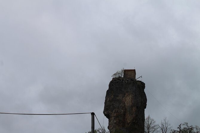 Chiatura. Soviet Past in the present. + Katskhi pillar - Katskhi Pillar: A 40m Limestone Monolith and a Monastery Above