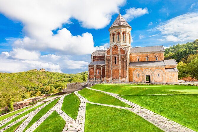 From Tbilisi: 4-day Tour in Georgia with Airport Transfers - Day 2 in the Kazbegi corridor: Zhinvali Dam, Ananuri fortress, and a big view