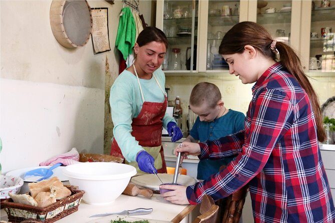 Join a Local for a Market Tour, Cooking Class and Meal in her Tbilisi Home - Local alcohol and meal table details