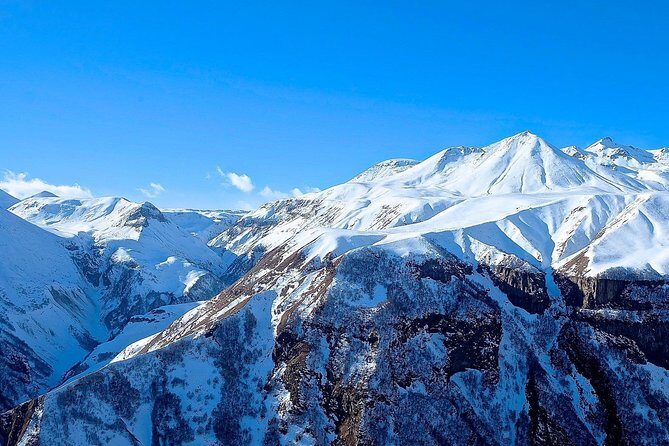 Kazbegi, Gergeti and Ananuri Full Day Tour from Tbilisi - The Stops That Add Variety: Friendship Monument and Seaside Park