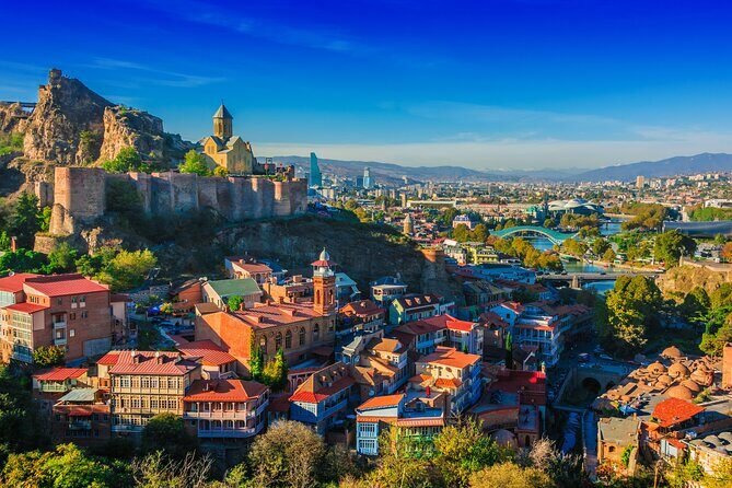 Tbilisi City Tour with Street Photography - Stop 1: Chronicles of Georgia and the sculpted-history photo moment