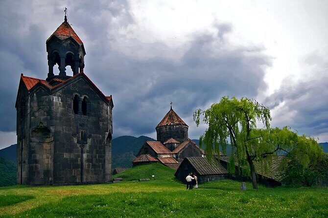 Tbilisi to Armenia Sanahin Haghpat Akhtala Monastery Group Tour - Crossing Into Akhtala: Fortress Views and Frescoes at Akhtala Monastery