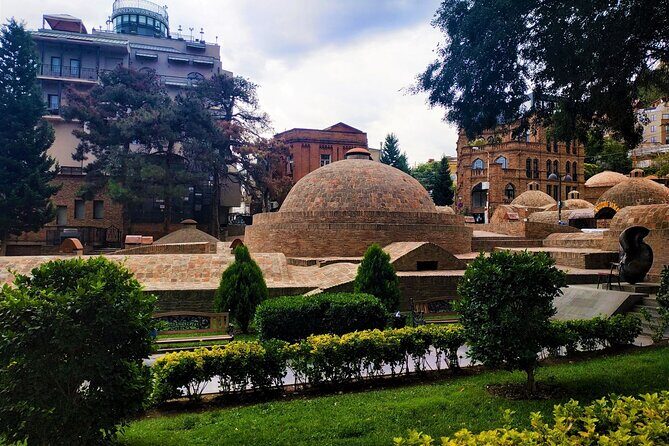 Tbilisi Walking Tour with Cable Car, Wine Tasting & Bread Bite - Rezo Gabriadze Marionette Theater and the Bridge of Peace: Local Quirk Meets Modern Art