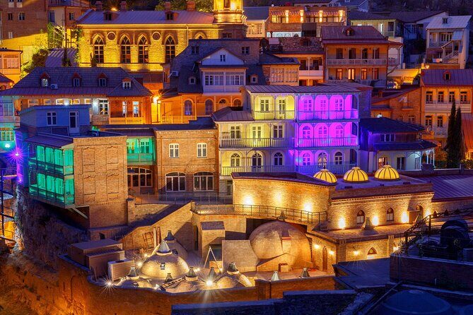 Tbilisi:Evening Walking & Talking Tour with Wine & Boat Ride - Why Tbilisi at night changes the tour experience