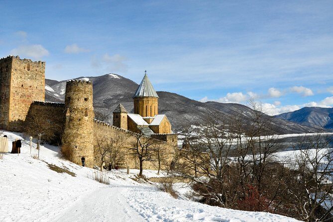 Tour to Kazbegi Ananuri Zhinvali Gudauri Full Day - Ananuri Fortified Castle Ensemble: Stone Walls, Two Churches, and Carved Facades